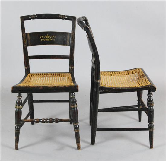 Hitchcock of Alford, Conneticut. A set of five early 19th century American parcel gilt ebonised dining chairs, W.1ft 4.5in. H.2ft 10in.